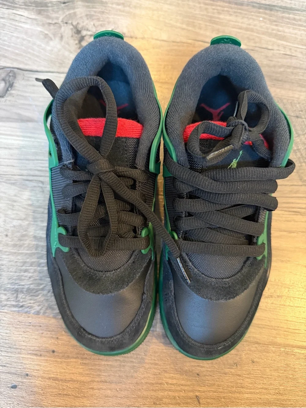 NWOT Kids Air Jordan 4 RM (size 4Y)